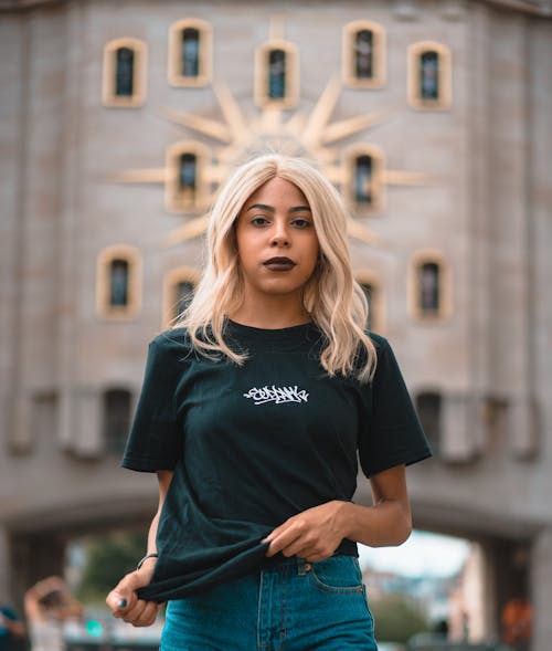 Woman Holding Her T-shirt