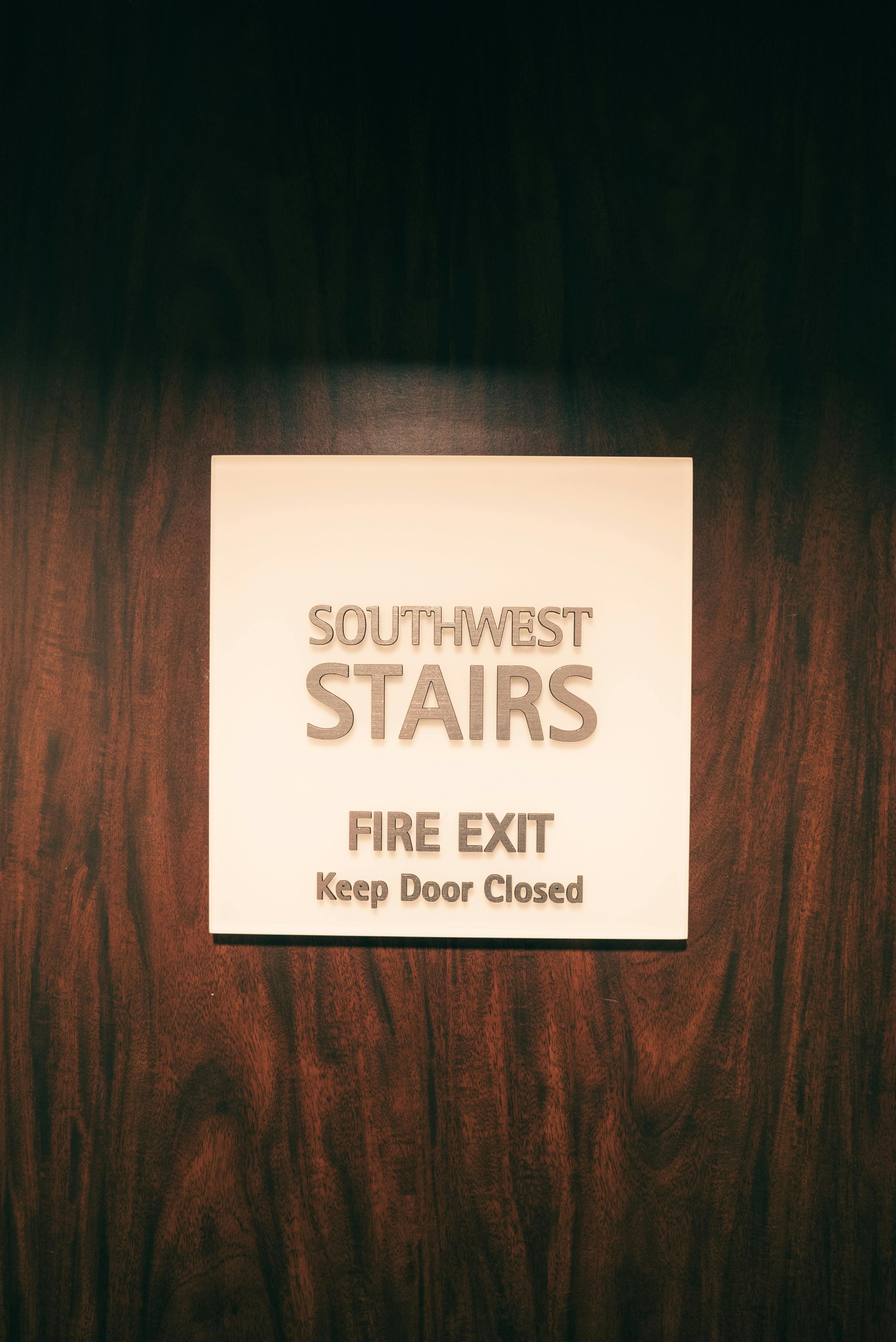 sign on the fire exit stairwell door