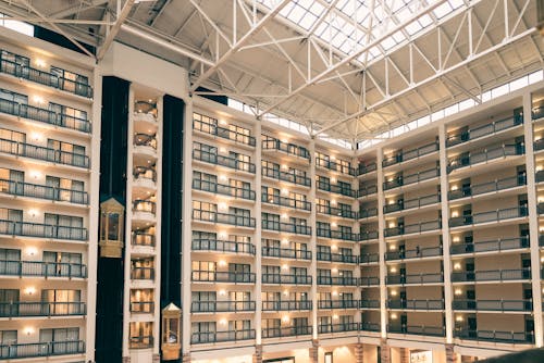 The atrium of a hotel with a large glass ceiling