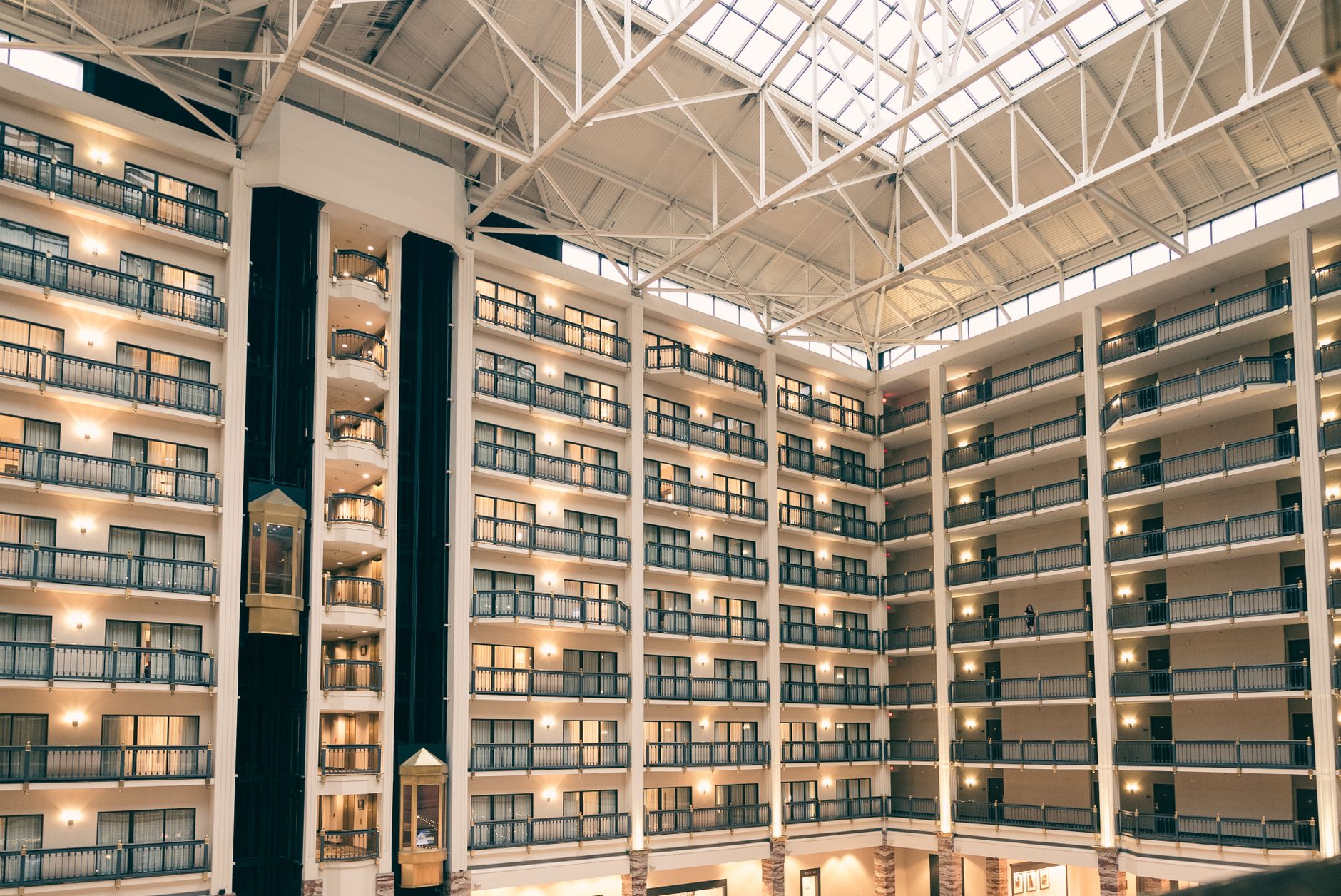 bright hospital atrium with wayfinding signage
