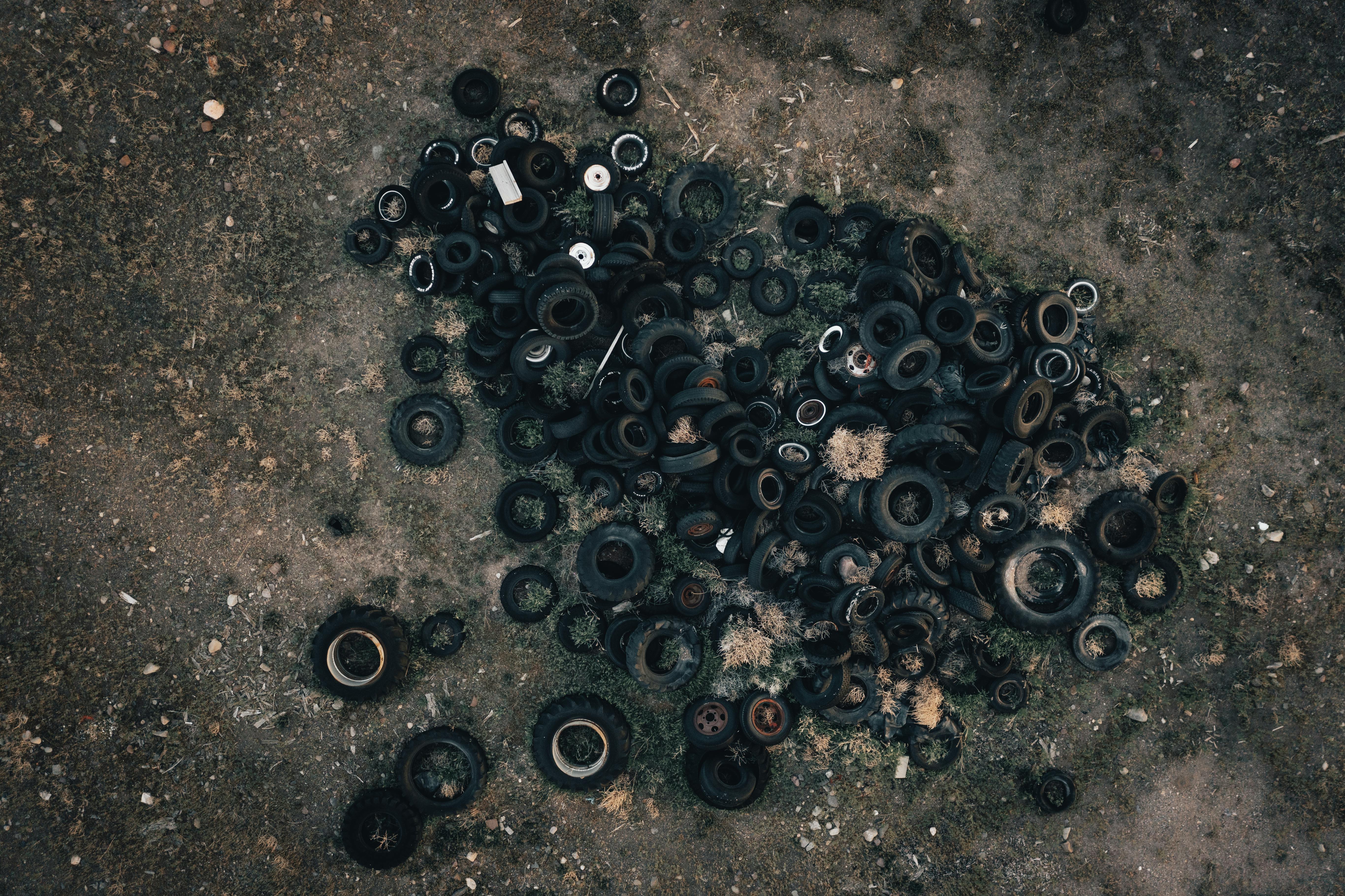 Recycled rubber mulch is made from discarded tires, reducing landfill waste. - recycled rubber mulch