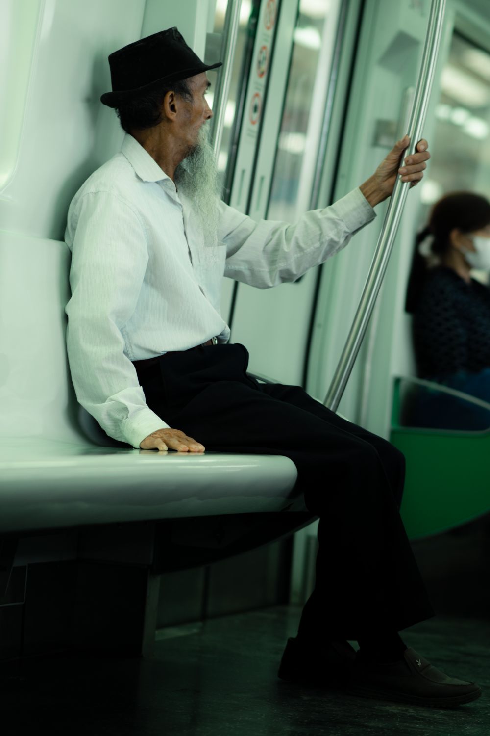 Guy Riding Train Senior Man Riding a Train · Free Stock Photo