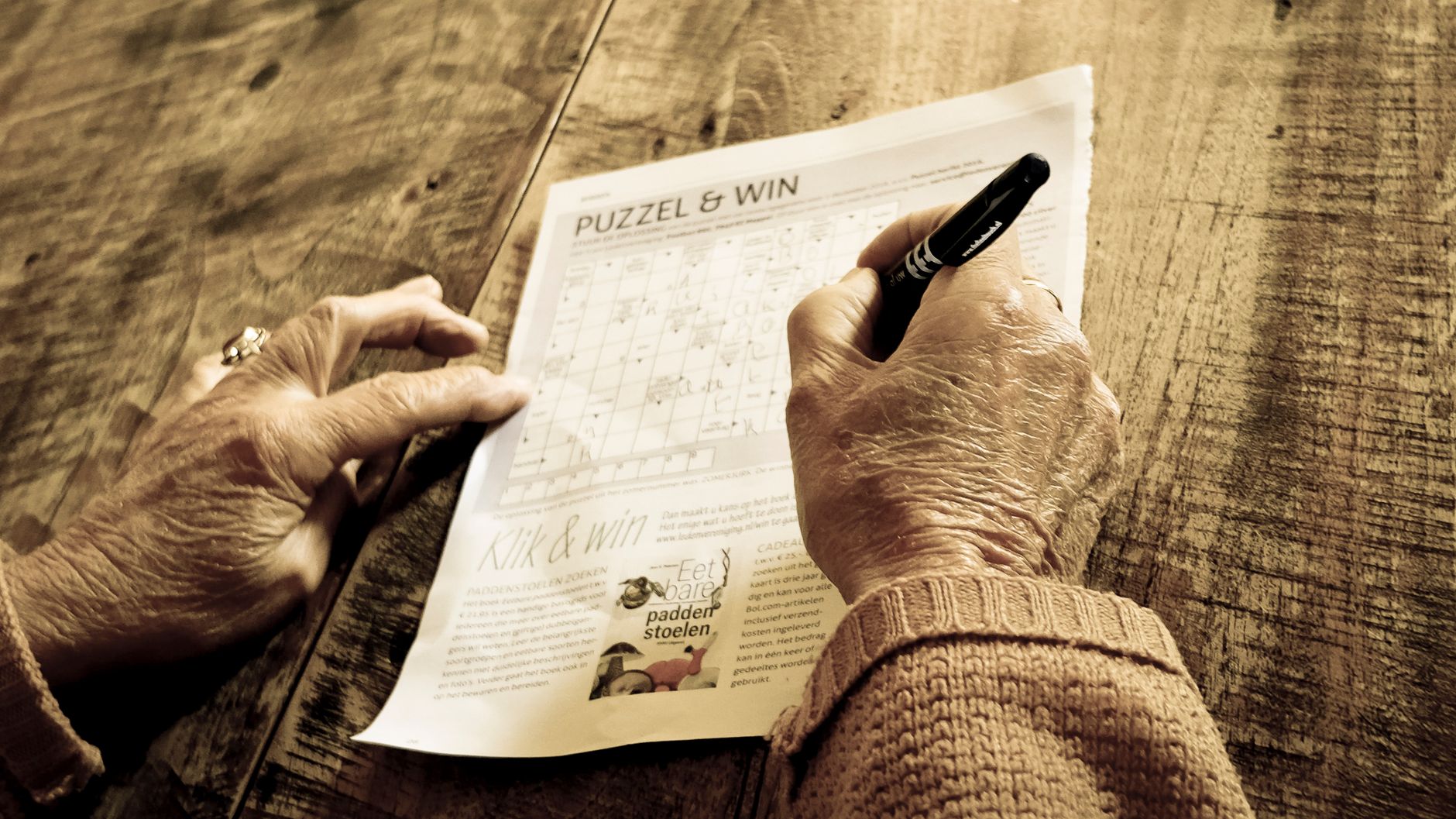 A frustrated person looking at a messy draft on their computer.
