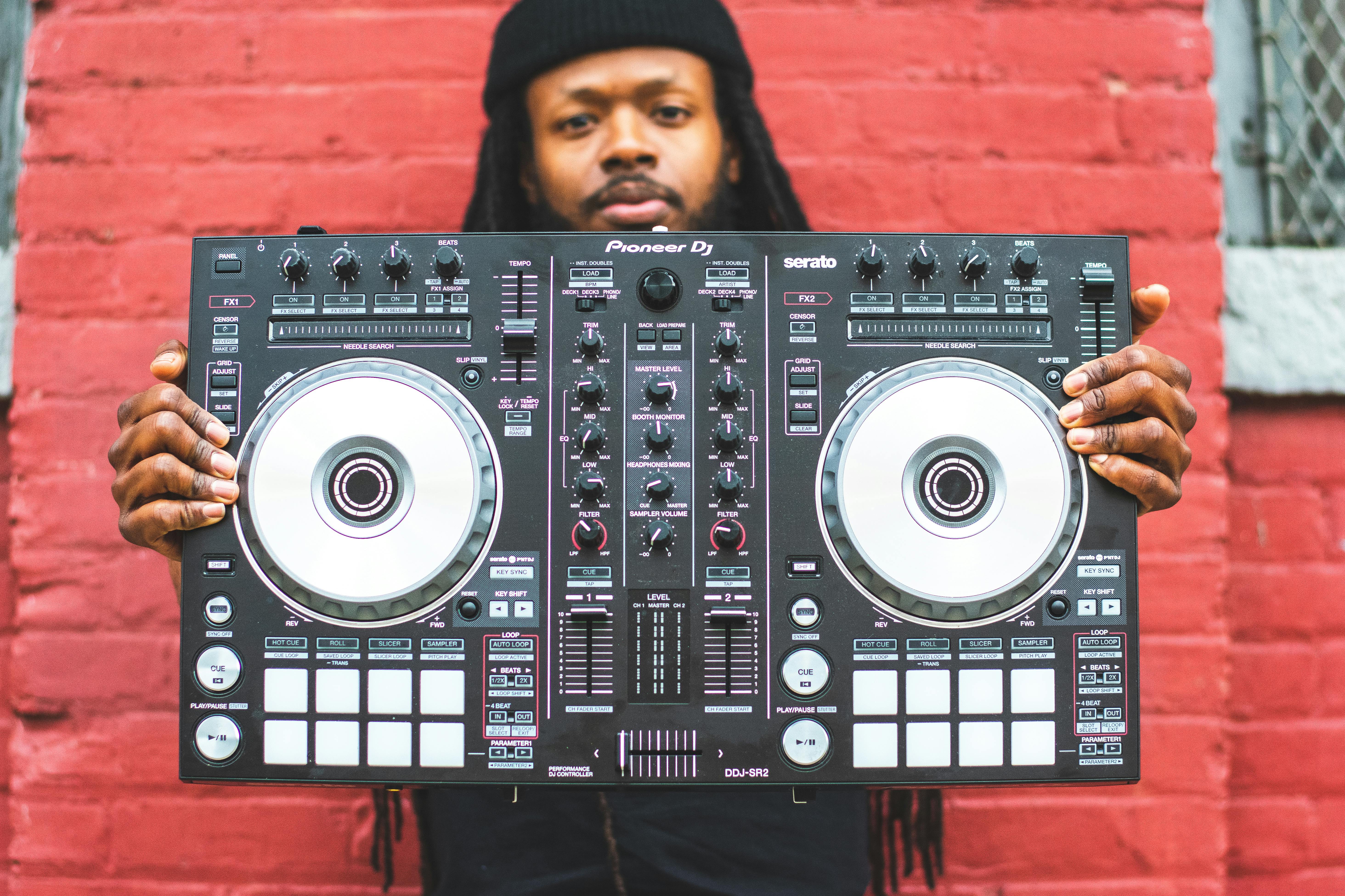 Man Holding Black Dj Turntable