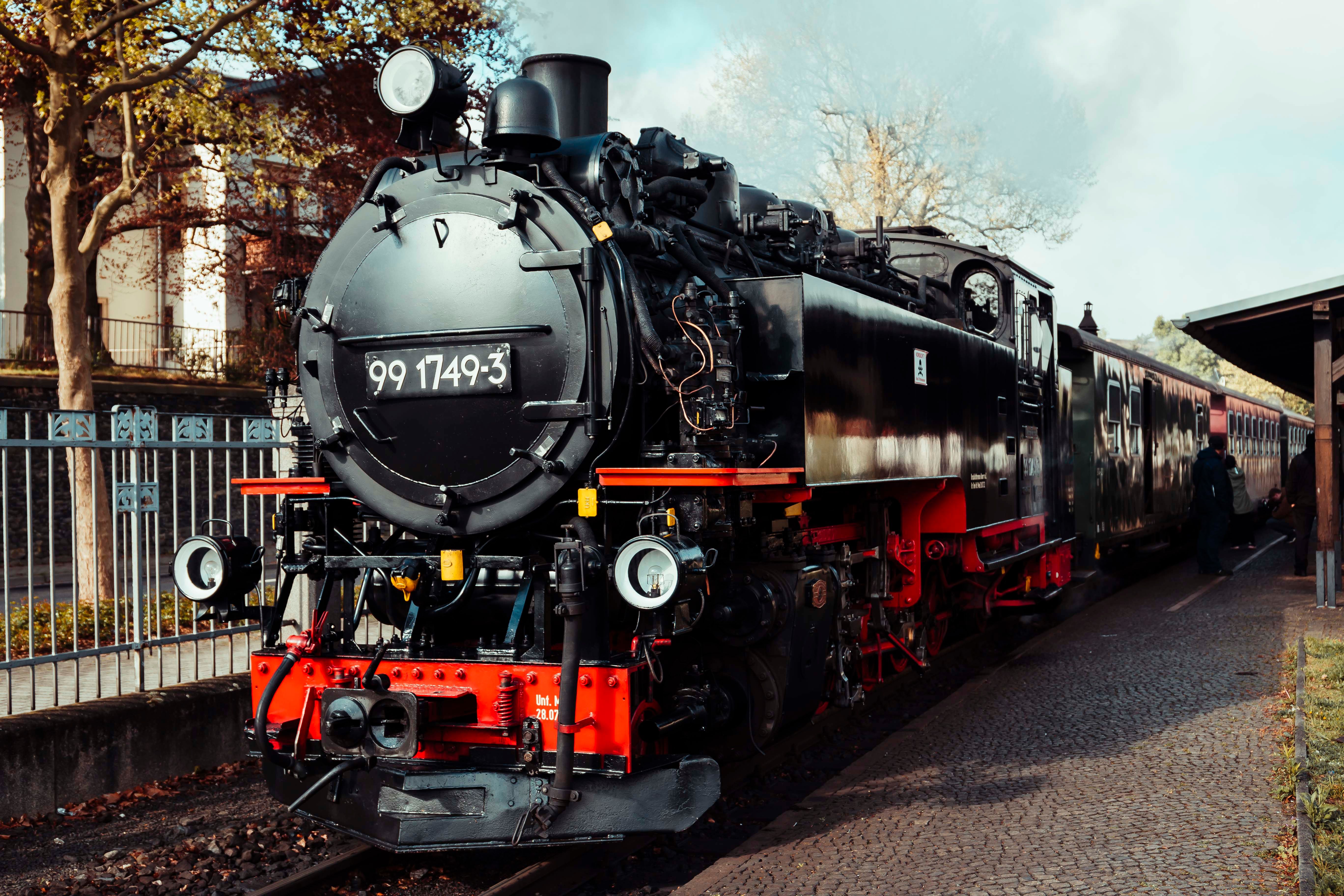 A classic steam train at Oybin station, capturing the charm of historic railway travel.