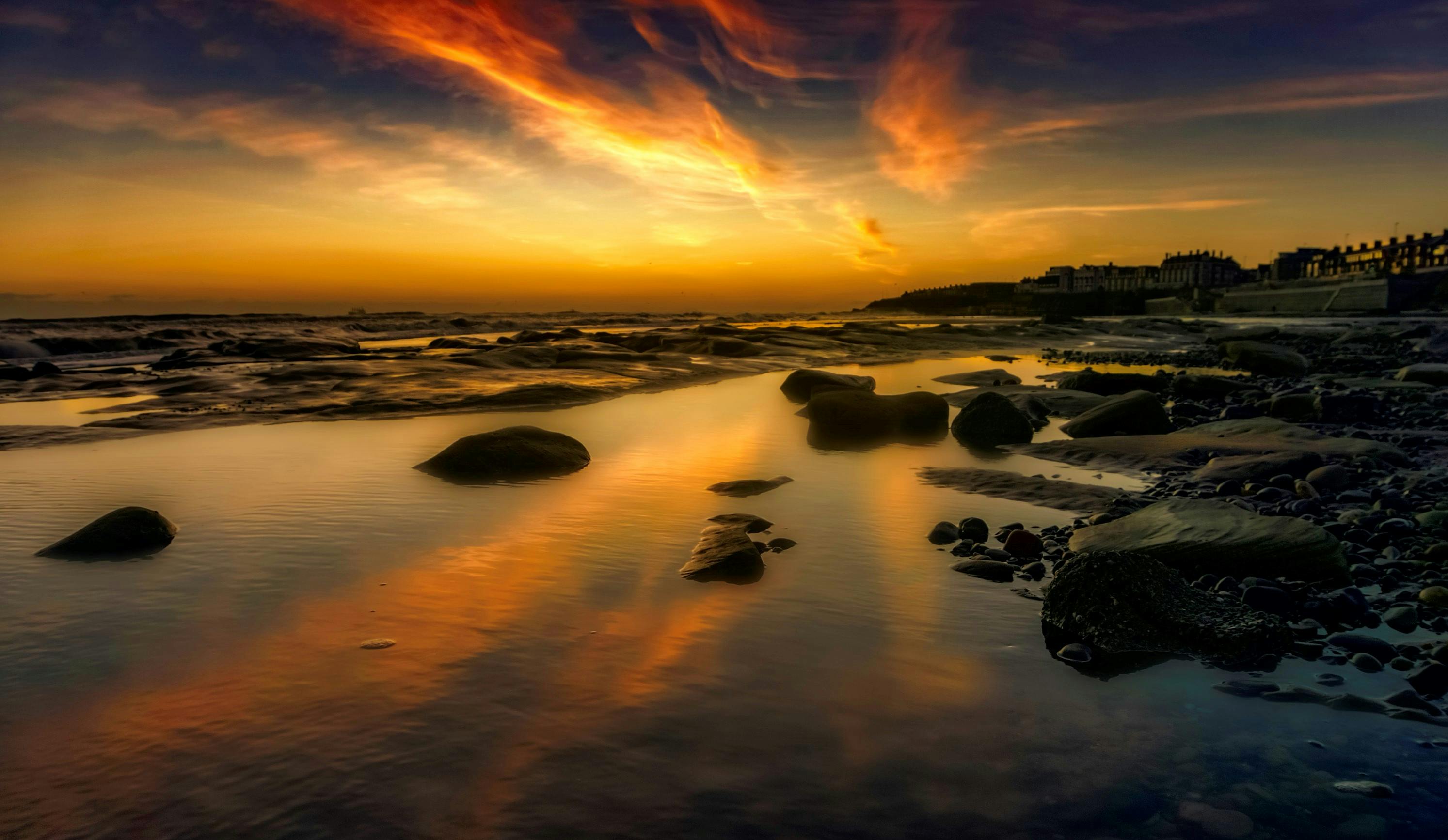 Beach During Sunset · Free Stock Photo