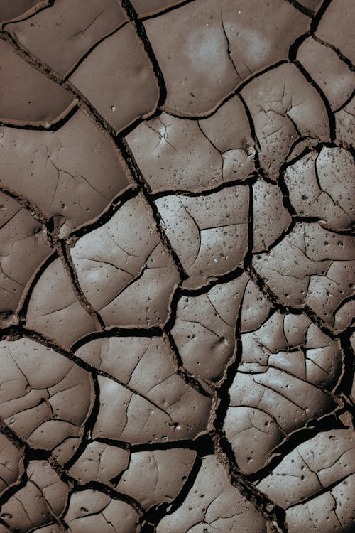 A close up of a cracked and cracked surface