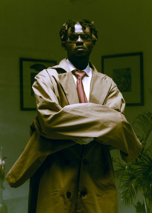 Free Artistic portrait of a stylish musician in Lagos, featuring a vintage fashion style. Stock Photo
