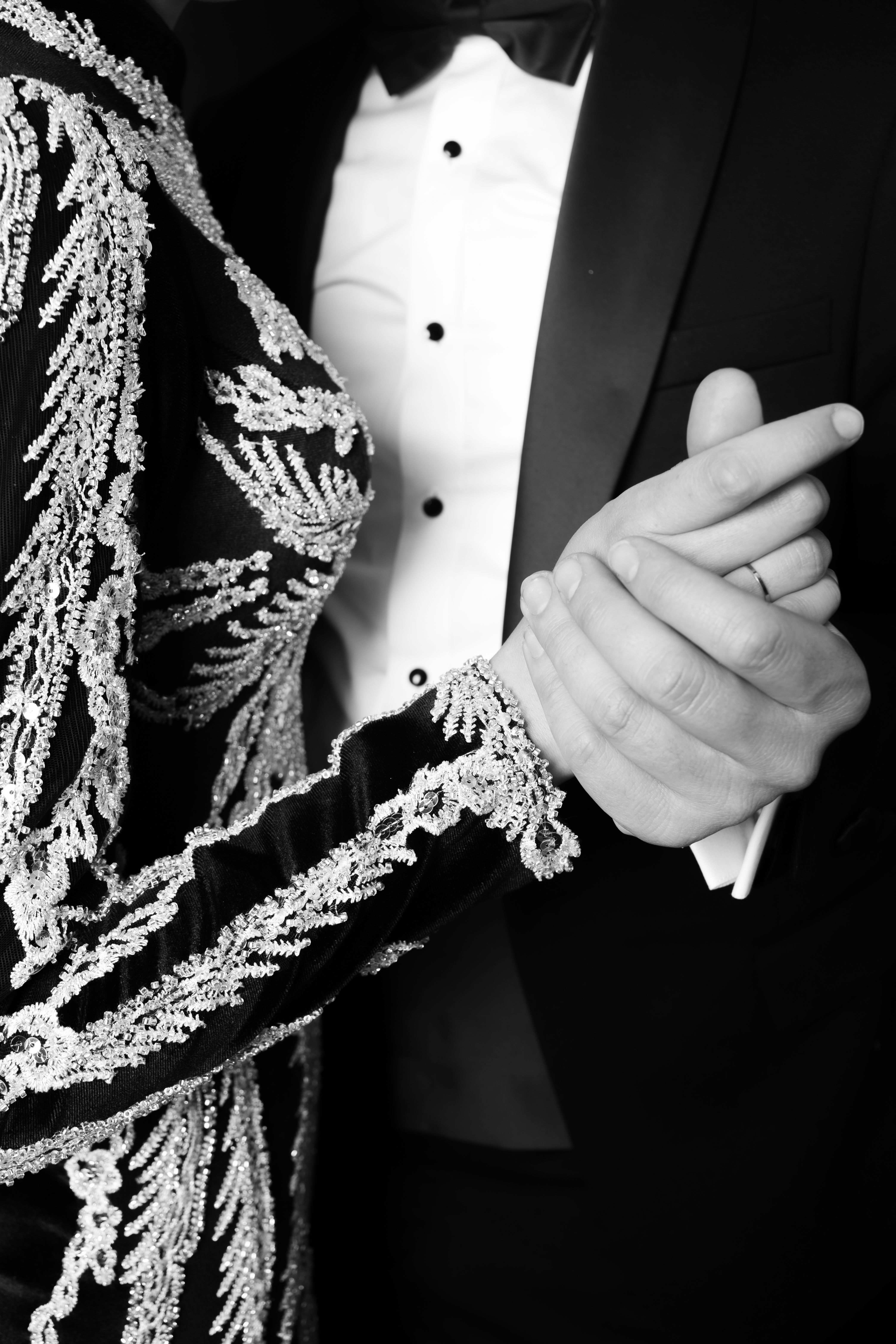 Newlyweds Holding Hands in Black and White · Free Stock Photo
