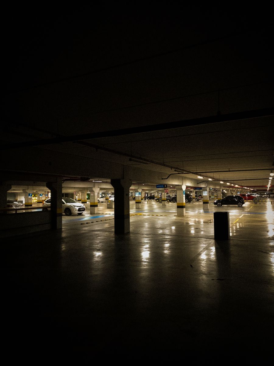Concrete columns and parking spaces in a garage