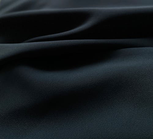 Black fabric with a dark blue background