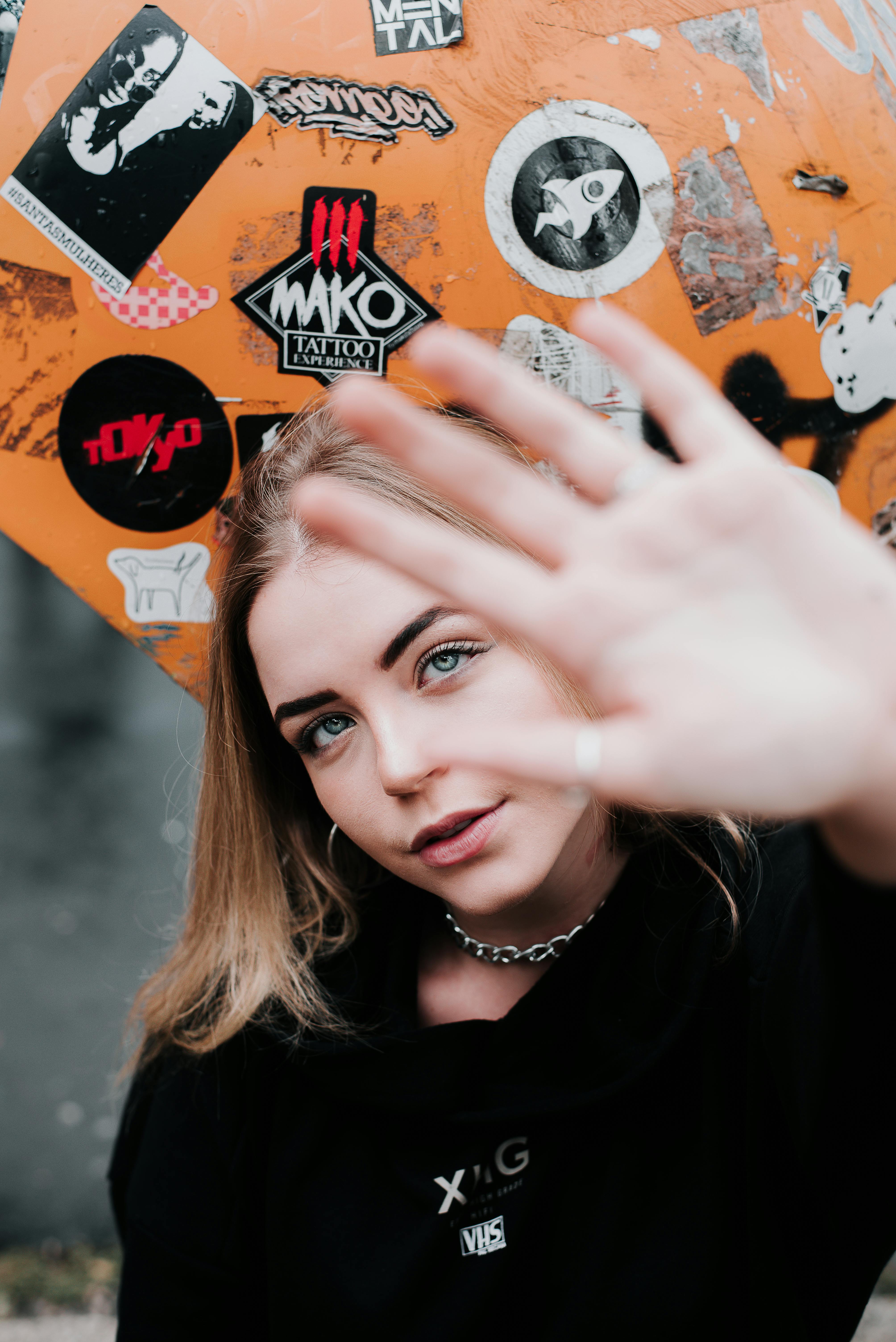 Woman Wearing Black Top Showing Palm