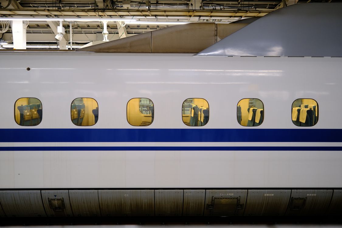 Is the Japan Rail Pass worth it in 2026 - inside a Shinkansen bullet train window at Tokyo Station