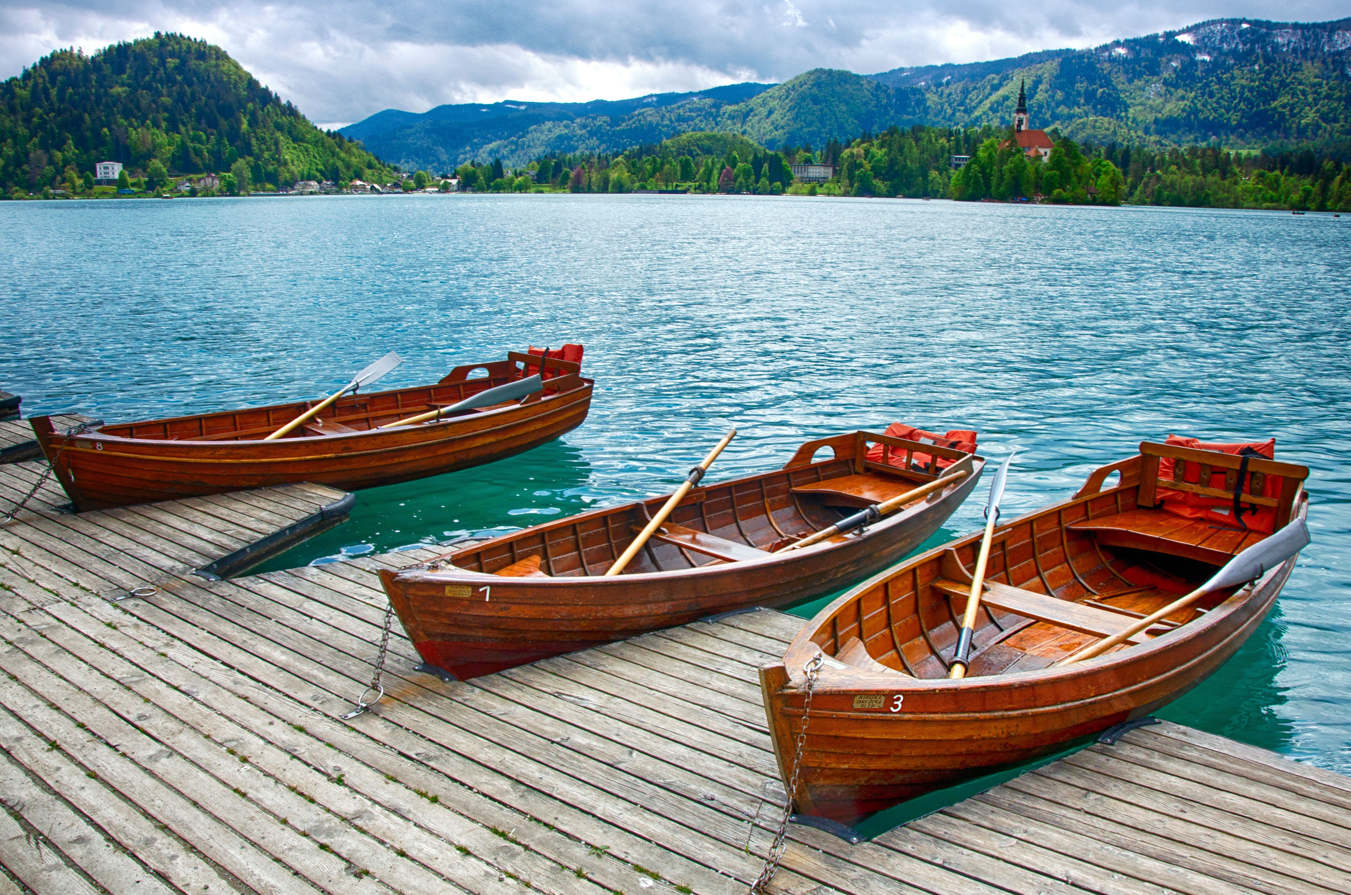 Wooden Boats on Pier on Lakeshore · Free Stock Photo