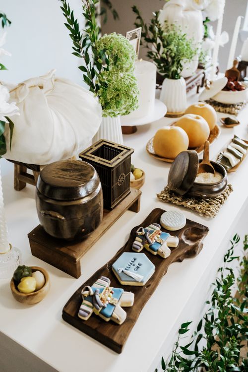 Free Beautiful arrangement of Korean traditional decorations and sweets on a table, perfect for cultural celebrations. Stock Photo
