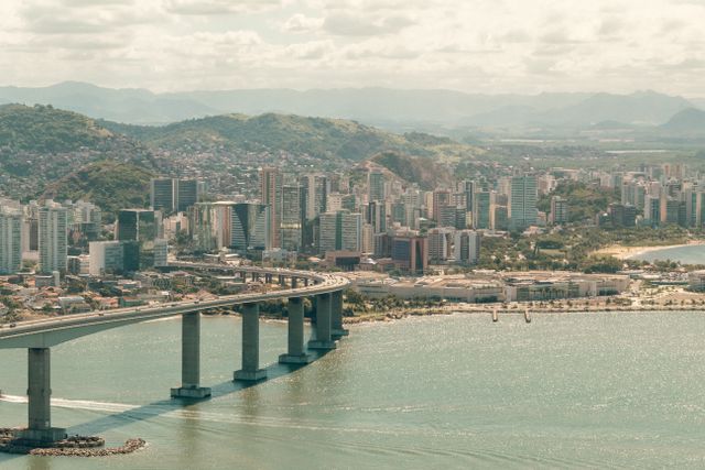 Stunning aerial shot of Vitória, Brazil, showcasing Terceira Ponte and urban skyline.