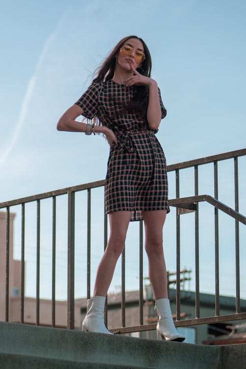 Woman Standing On Stairs