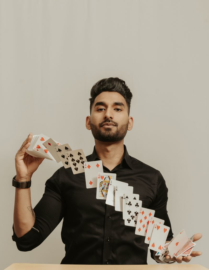 Child volunteer on stage helping magician with trick in Ghaziabad