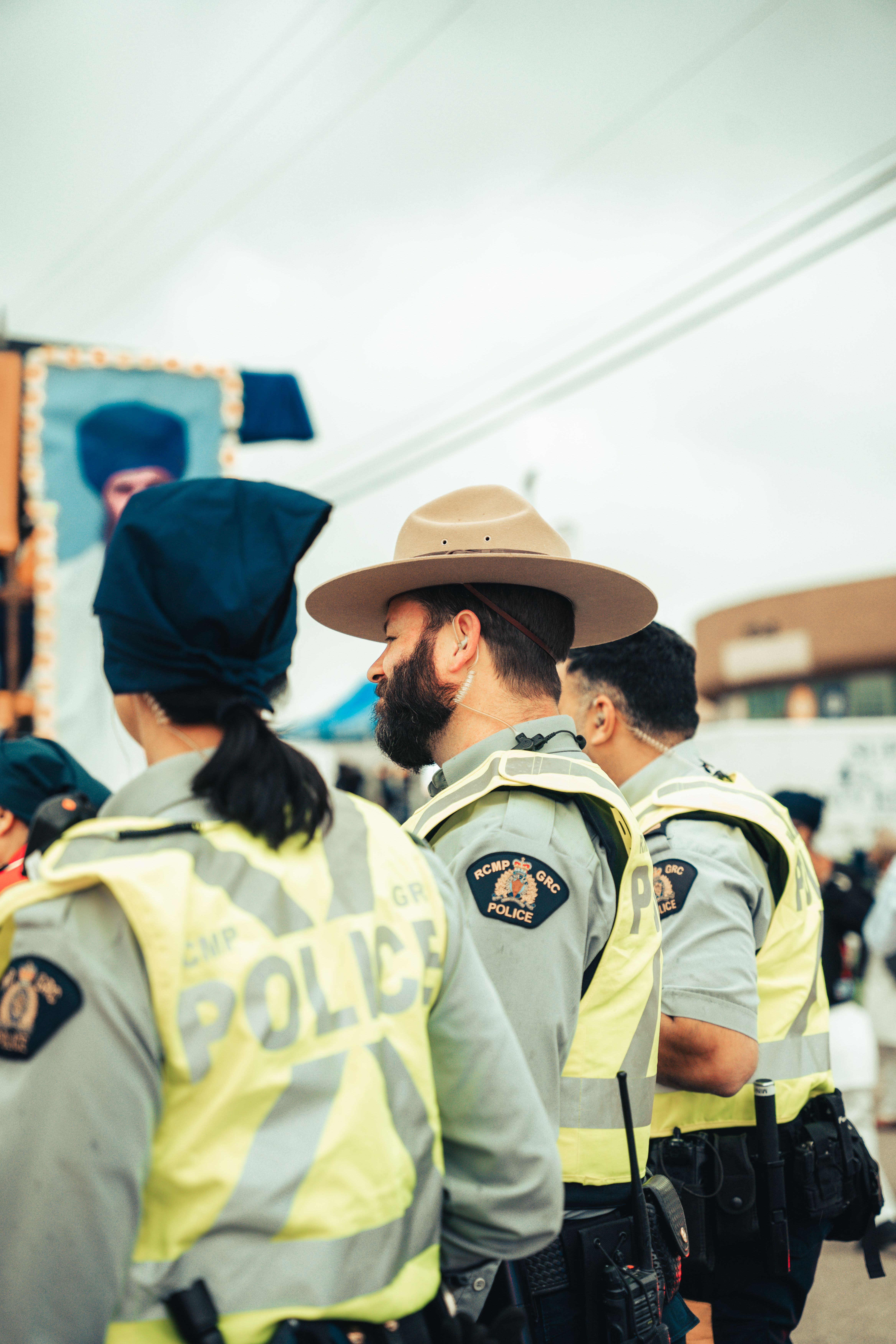 candid photo of a group of police officers walking on a street