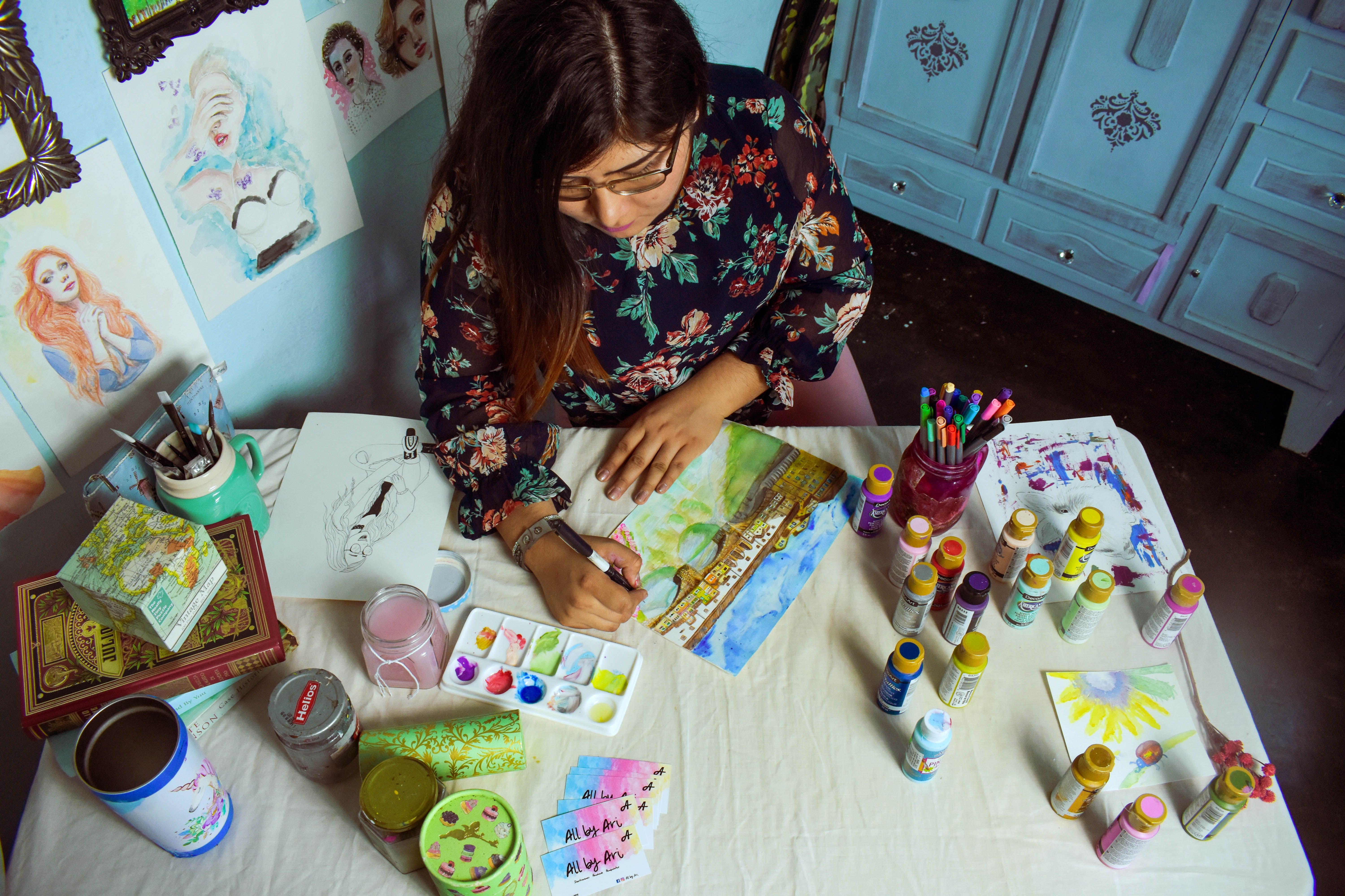 High Angle Shot of a Woman Painting with Watercolors · Free Stock Photo