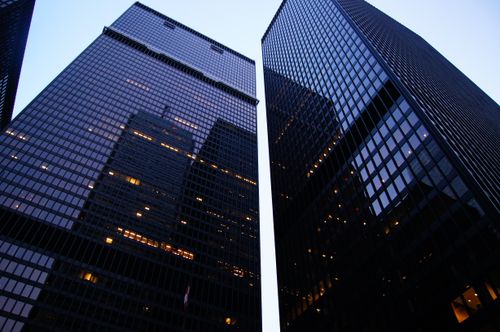 Free Dramatic low angle view of Toronto's skyscrapers reflecting the evening sky. Stock Photo