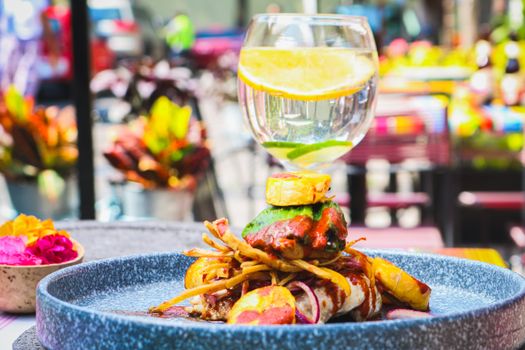 Close-up of a colorful Mexican meal with a lemon drink, capturing the essence of Ciudad de México dining.
