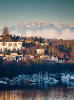 Captivating city skyline with the majestic Olympic Mountains in the backdrop.