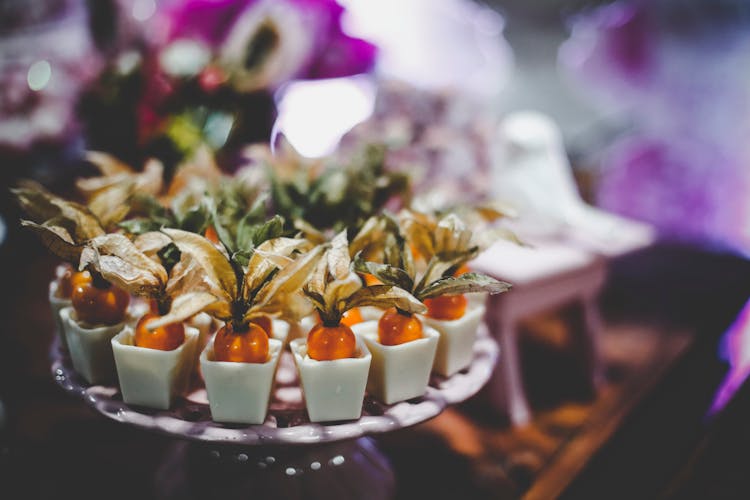 White And Orange Party Favors In Tray