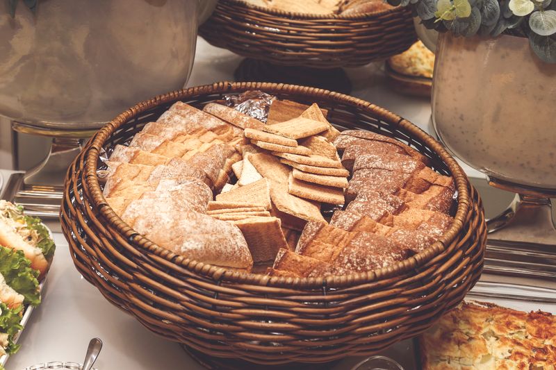 Bakery catering boxes opened across a welcoming Sydney event table