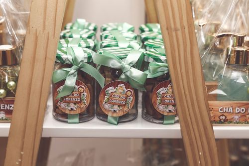 Free Cute and colorful jars tied with ribbons as party favors, perfect for a baby shower gift table. Stock Photo