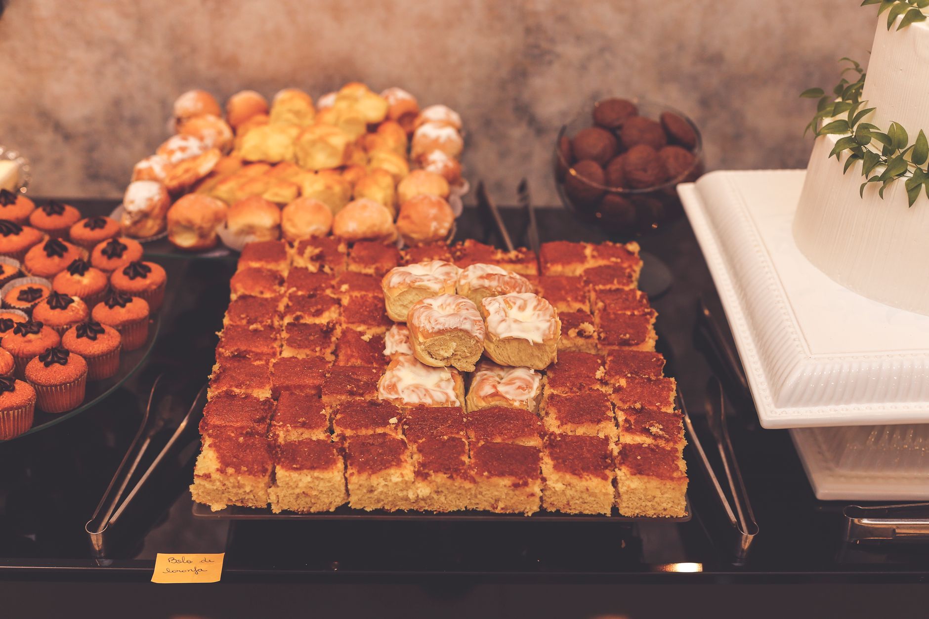 An elegant display of assorted pastries on a table, perfect for events.