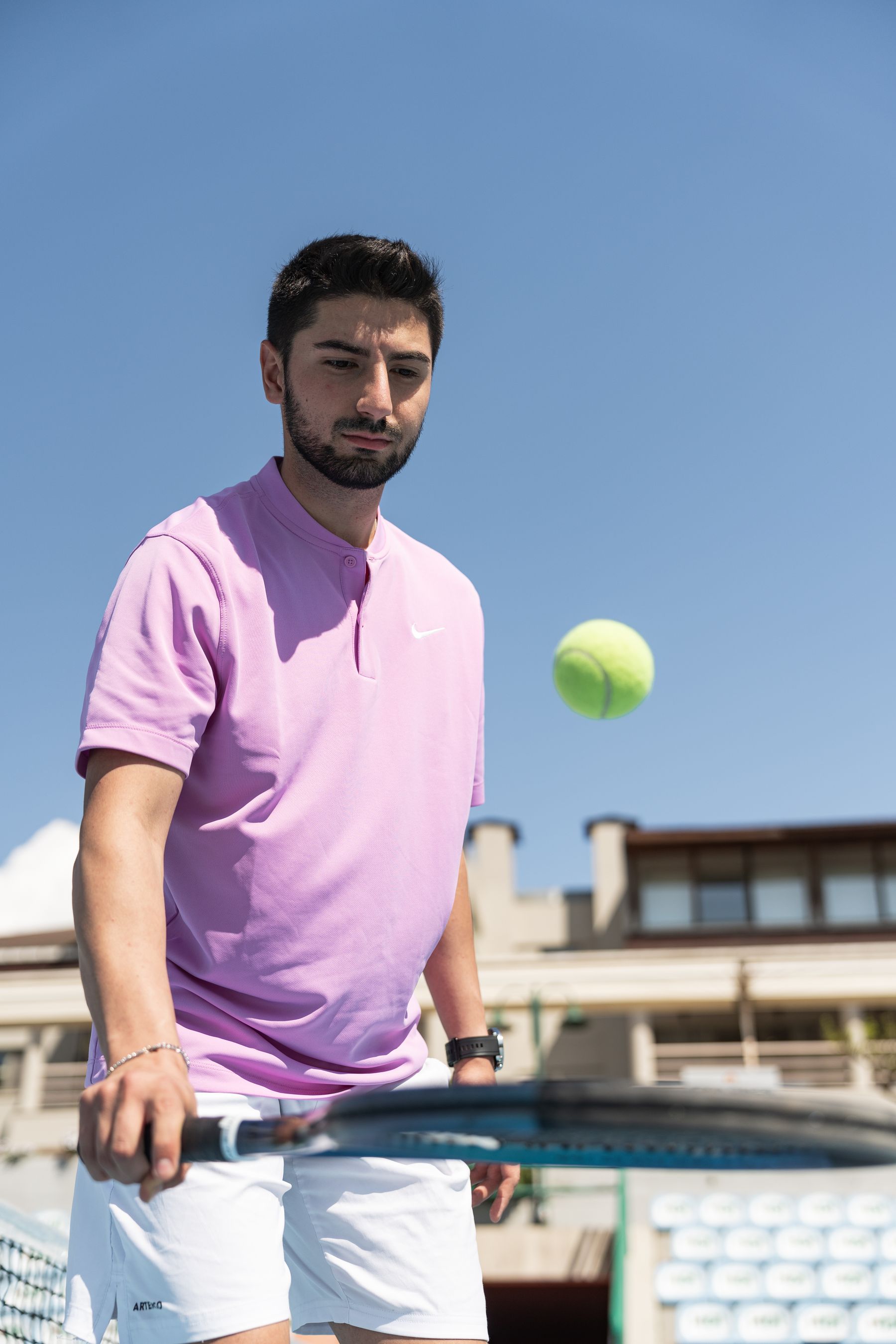 Tennis scene illustrating A Parent’s Guide to Junior Tennis Levels.