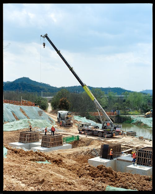 A crane lifting a large concrete structure