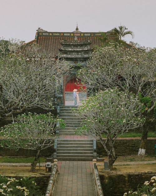 A chinese temple with a pathway leading to it