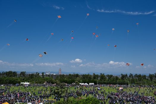 Spectacular view of kites at Hamamatsu Kite Festival, Japan. Perfect summer day outdoor fun with a large crowd.