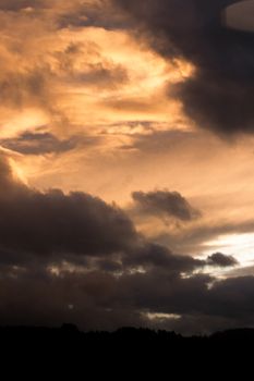 Captivating view of a dramatic evening sky with storm clouds over Santander, Spain.