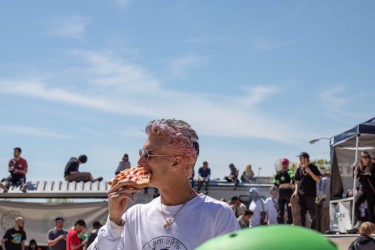 Man Eating Pizza