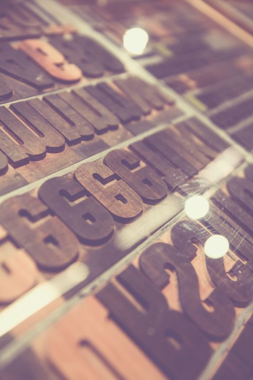 Wooden letterpress type blocks, photo by Markus Spiske on Pexels