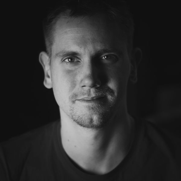 Black-and-white portrait of a maker looking at the camera — photo by Jan Tafel on Pexels