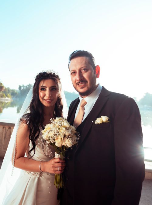 Free Elegant portrait of a bride and groom during their wedding day in Baghdad, Iraq. Stock Photo