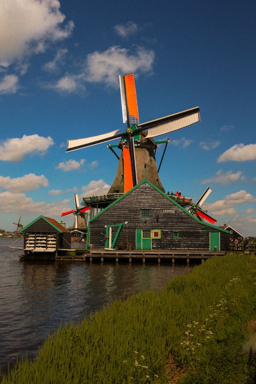 Free Traditional windmill at Zaanse Schans, Netherlands under clear blue sky. Stock Photo