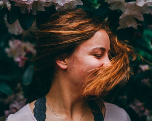 Free Woman Waving Hair Covering Her Face Stock Photo