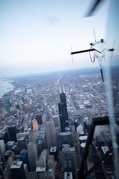 Stunning aerial shot of Chicago skyline featuring Willis Tower at twilight. Perfect for urban exploration themes.