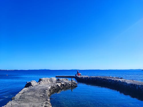 Gratis stockfoto met aanlegsteiger, blauw water, blauwe zee