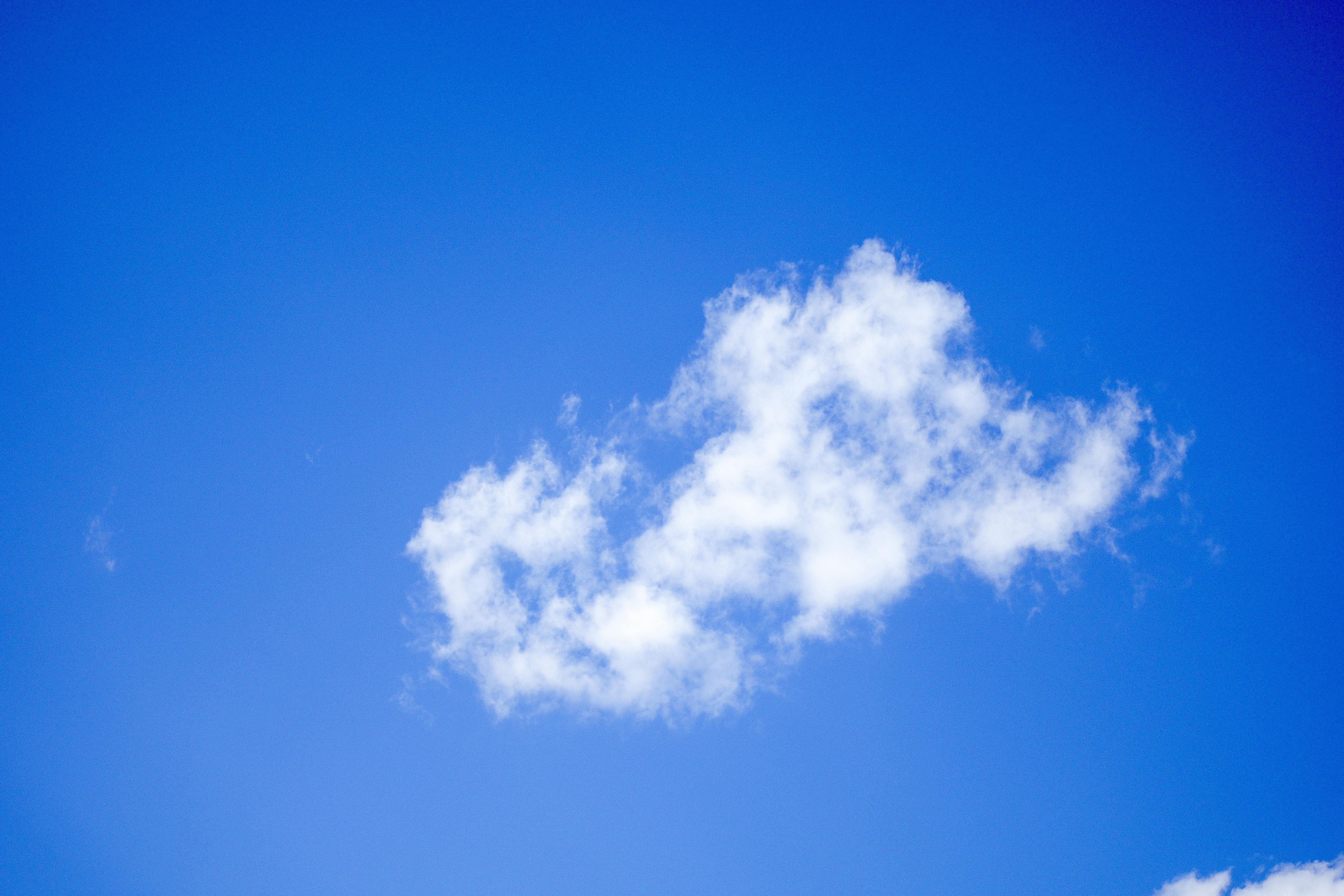 white cloud in blue sky