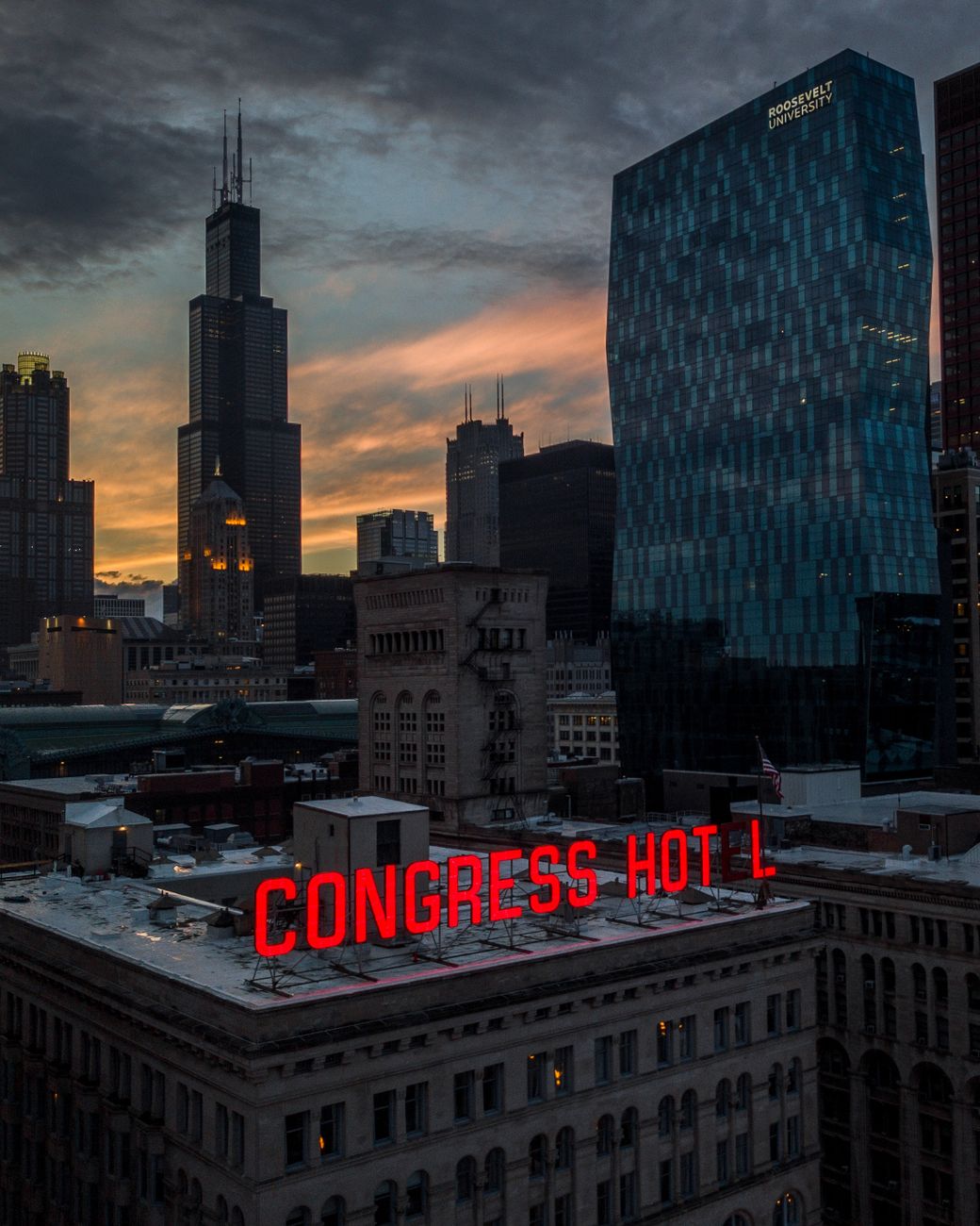 Stunning view of Chicago skyline during sunset featuring Congress Hotel and Willis Tower