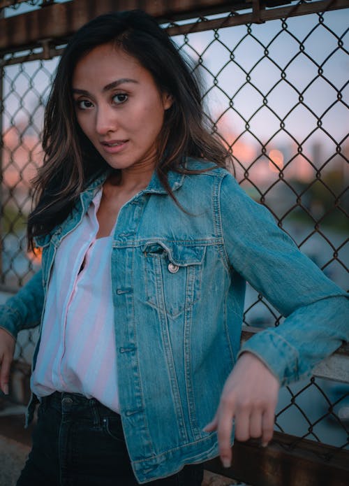 Photo of Woman Wearing Denim Jacket