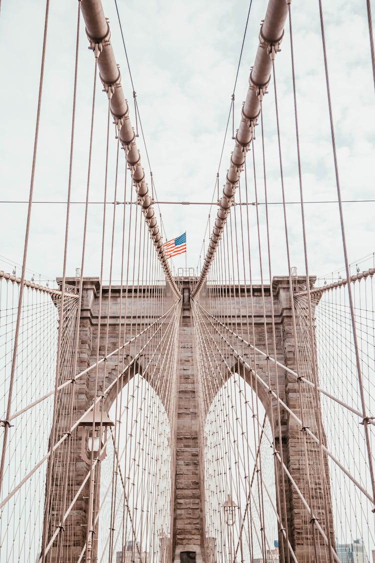 American Flag On Top Of Bridge