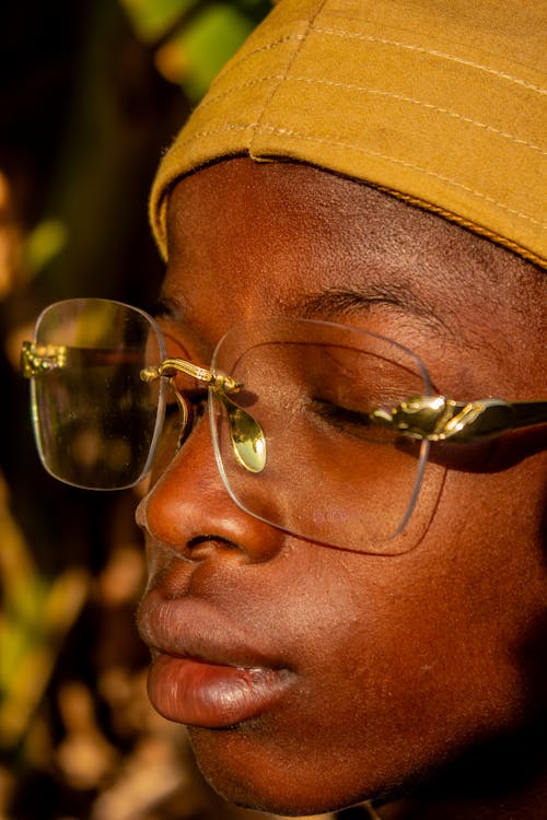 A close up of a person wearing glasses