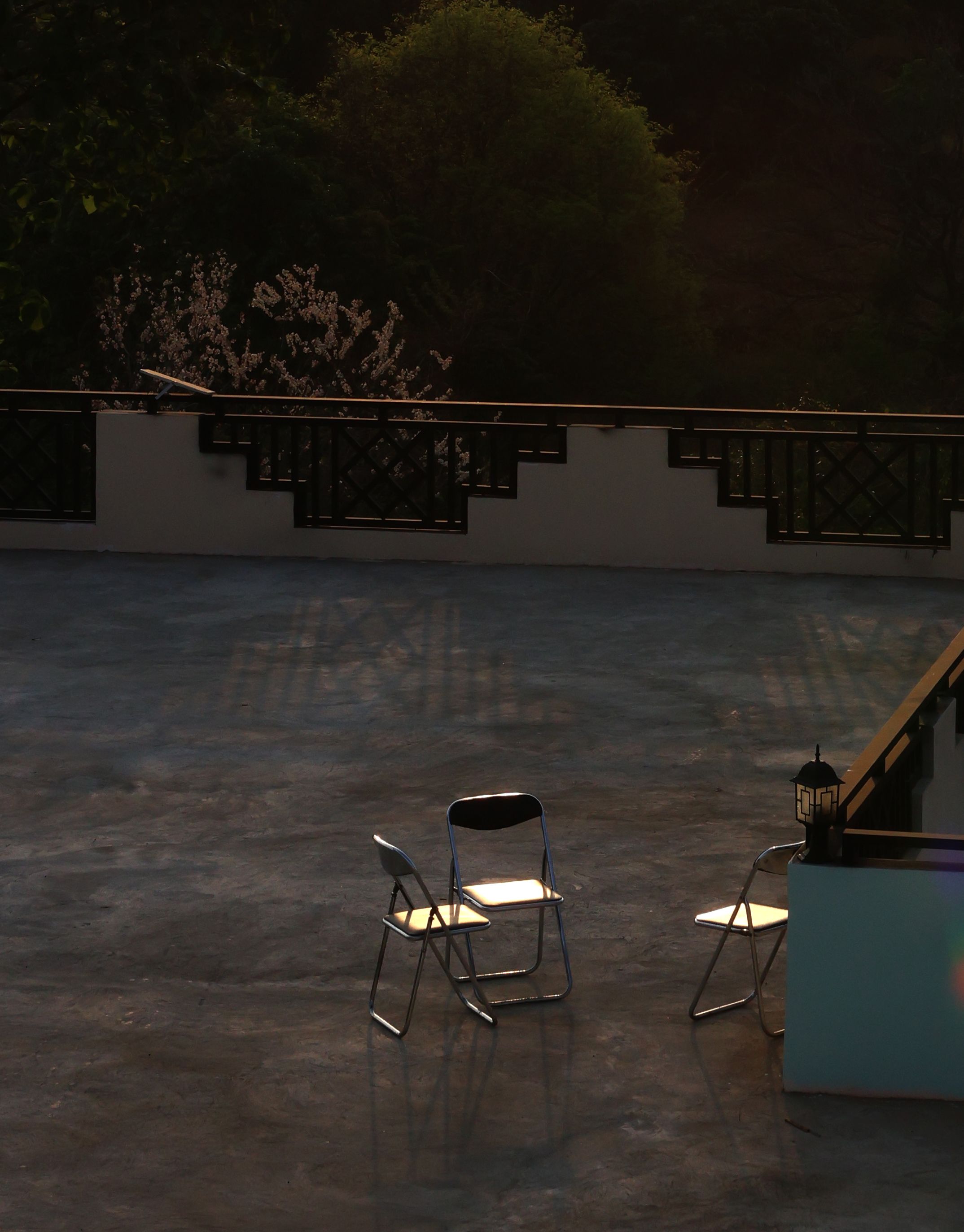 Calm evening on a terrace with chairs and scenic surroundings in Popa, Myanmar.